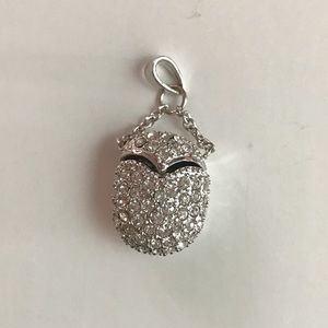 14K gold plated CZ purse pendant.